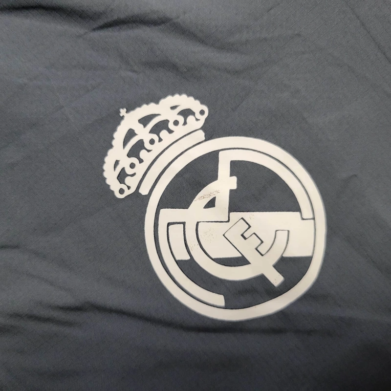 Jaqueta Corta-Vento Real Madrid 24/25 Masculino Adidas - Cinza