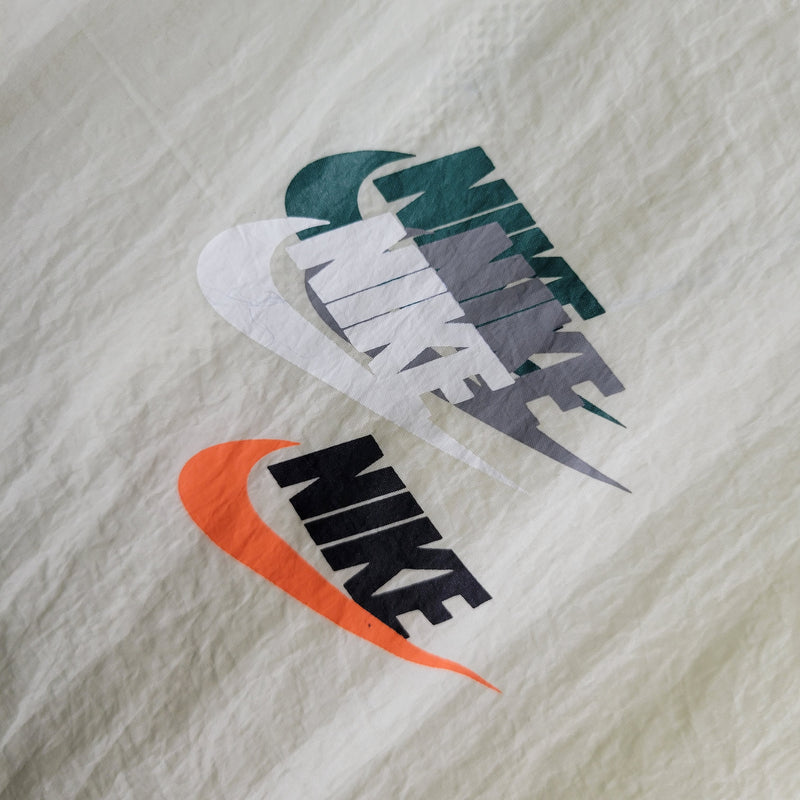 Jaqueta Corta-Vento Nike - Off White