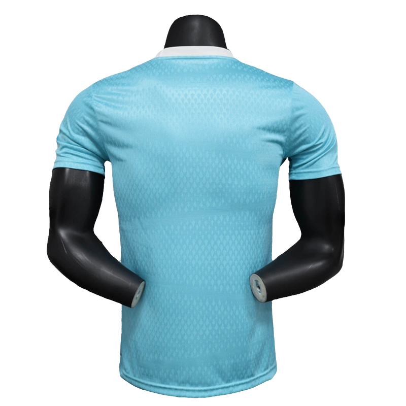 Camisa Arsenal 25/26 Pré-Jogo - Azul Celeste - Versão Jogador